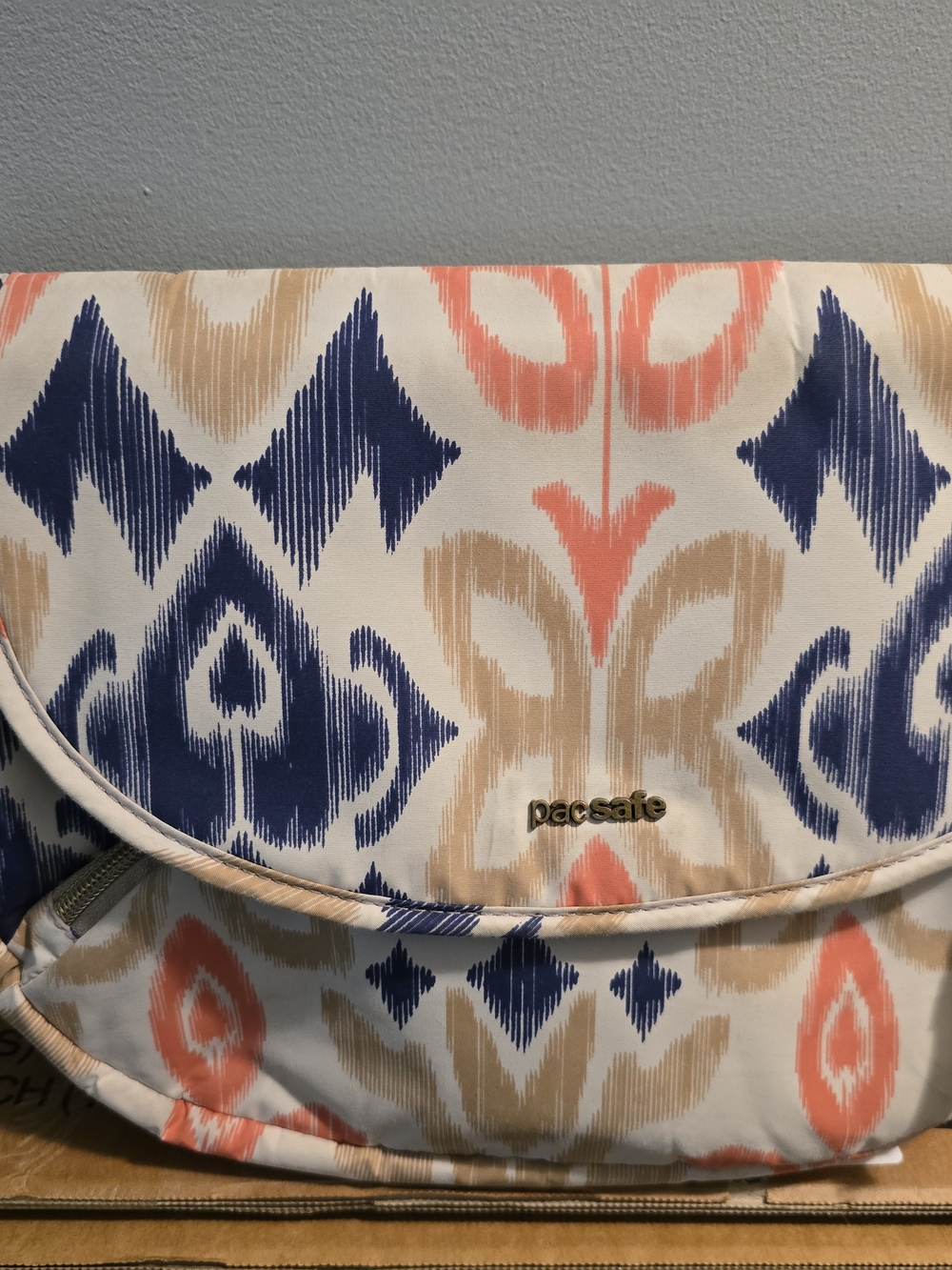Pacsafe Floral Ikat Crossbody Bag in Navy, Coral & Beige